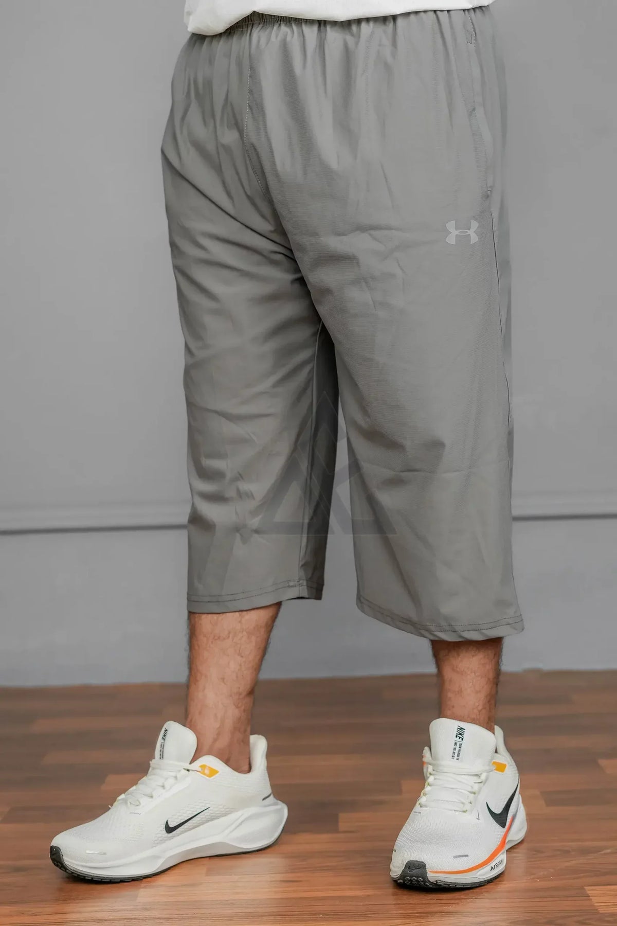 UA 3 Qtr Drifit Short T12 - Grey