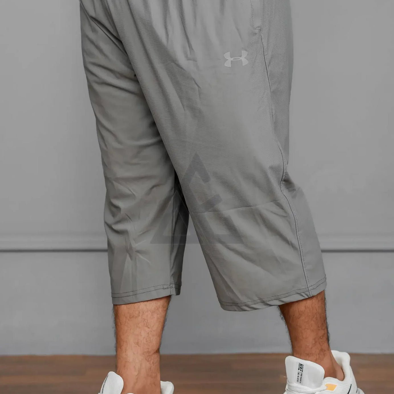 UA 3 Qtr Drifit Short T12 - Grey